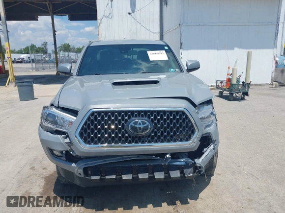2019 Toyota Tacoma SR with VIN 3TMCZ5AN1KM274625, listed as a IAAI auction lot 42660593 with 163,460 mi miles and . Bid and sale history available at DreamBid. Image 12.