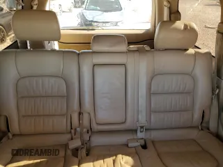 2000 Lexus LX 470 z VIN JT6HT00W7Y0114787, wystawiony jako Copart lot #84433924 z przebiegiem Nie podano mil oraz Szkoda całkowita • Salvage title. Historia ofert i sprzedaży dostępna na DreamBid. Obrazek 10.