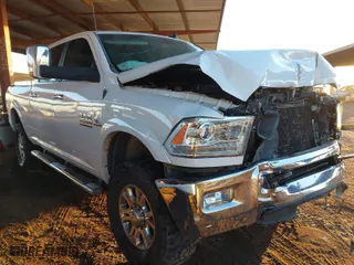 2018 Ram 2500 Laramie with VIN 3C6UR5FL0JG115269, listed as a IAAI auction lot 41310111 with 134,756 mi miles. Bid and sale history available at carsss.com. Image 1.