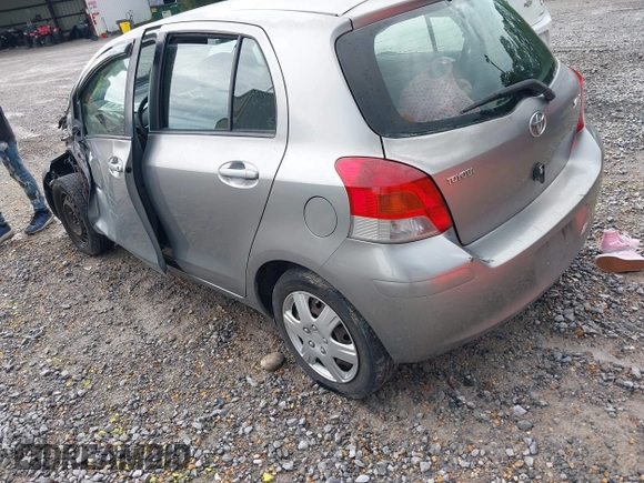2010 Toyota Yaris with VIN JTDKT4K37A5281975, listed as a IAAI auction lot 39843782 with 257,802 mi miles. Bid and sale history available at carsss.com. Image 3.