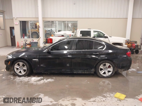 2012 BMW 5 Series 528i xDrive with VIN WBAXH5C51CDW03156, listed as a IAAI auction lot 41236722 with 189,196 mi miles and . Bid and sale history available at DreamBid. Image 14.