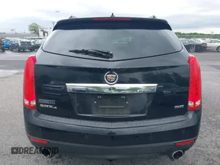 2015 Cadillac SRX Luxury Collection z VIN 3GYFNEE34FS510360, wystawiony jako IAAI lot #42343737 z przebiegiem 149 046 mil mil oraz . Historia ofert i sprzedaży dostępna na DreamBid. Obrazek 18.