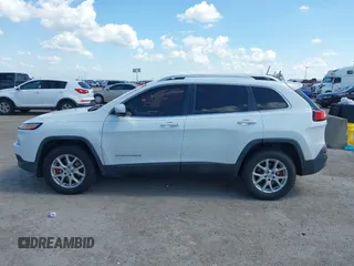 2016 Jeep Cherokee Latitude z VIN 1C4PJMCB9GW305259, wystawiony jako IAAI lot #42093050 z przebiegiem 228 747 mil mil oraz . Historia ofert i sprzedaży dostępna na DreamBid. Obrazek 14.