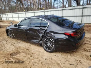 2023 BMW 5 Series 530e with VIN WBA13AG05PCM94563, listed as a Copart auction lot 87515145 with Not provided miles and Salvage title. Bid and sale history available at DreamBid. Image 2.