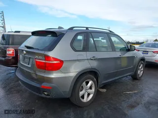 2007 BMW X5 3.0si with VIN 5UXFE43517LY81728, listed as a IAAI auction lot 41787988 with 82,999 mi miles. Bid and sale history available at carsss.com. Image 4.