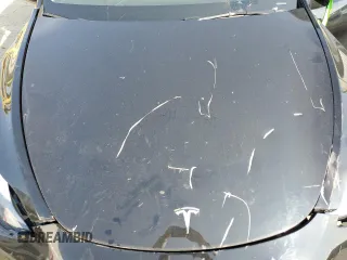 2024 Tesla Model Y z VIN 7SAYGDED7RF162680, wystawiony jako Copart lot #61991495 z przebiegiem Nie podano mil oraz Czysty tytuł • Clean title. Historia ofert i sprzedaży dostępna na DreamBid. Obrazek 11.