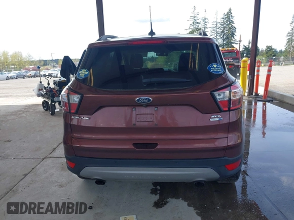 2018 Ford Escape SEL with VIN 1FMCU9HD0JUC36389, listed as a IAAI auction lot 41997627 with 96,739 mi miles. Bid and sale history available at carsss.com. Image 17.
