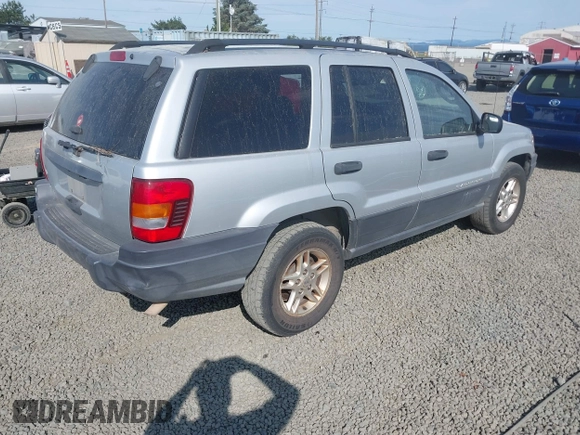 2004 Jeep Grand Cherokee Laredo z VIN 1J4GW48S34C272700, wystawiony jako IAAI lot #42494918 z przebiegiem 214 843 mil mil oraz . Historia ofert i sprzedaży dostępna na DreamBid. Obrazek 4.