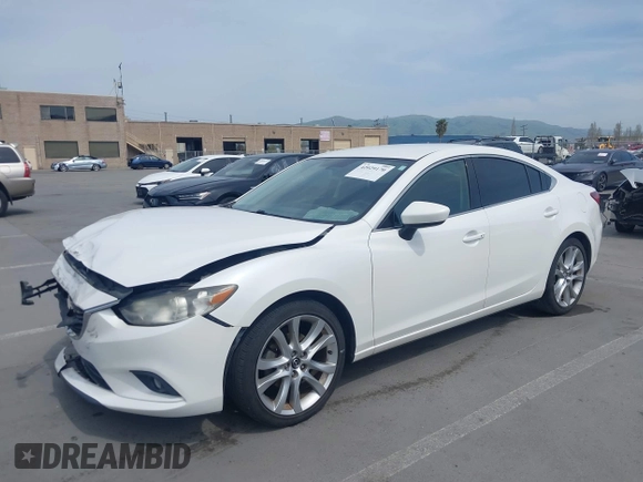 2016 Mazda Mazda6 i Touring with VIN JM1GJ1V57G1429887, listed as a IAAI auction lot 42029170 with 140,519 mi miles. Bid and sale history available at carsss.com. Image 17.