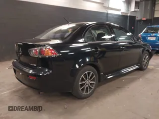2015 Mitsubishi Lancer SE with VIN JA32V2FW3FU019272, listed as a IAAI auction lot 41940708 with 107,433 mi miles and . Bid and sale history available at carsss.com. Image 4.