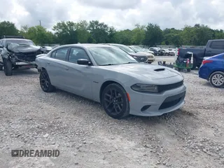 2022 Dodge Charger R/T with VIN 2C3CDXCTXNH240387, listed as a IAAI auction lot 42471923 with 66,616 mi miles and . Bid and sale history available at DreamBid. Image 1.