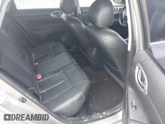 2014 Nissan Sentra S with VIN 3N1AB7AP8EY310027, listed as a IAAI auction lot 41142509 with 130,897 mi miles and . Bid and sale history available at DreamBid. Image 8.
