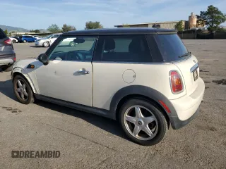 2010 MINI Hardtop with VIN WMWMF3C52ATZ65593, listed as a Copart auction lot 50107445 with 105,389 mi miles and Salvage title. Bid and sale history available at DreamBid. Image 2.