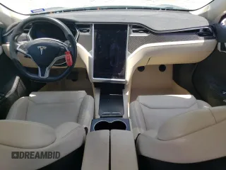 2017 Tesla Model S 100D with VIN 5YJSA1E25HF220902, listed as a Copart auction lot 56442684 with 83,297 mi miles and Salvage title. Bid and sale history available at DreamBid. Image 8.