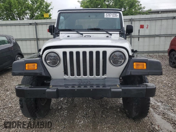 2004 Jeep Wrangler X with VIN 1J4FA39S24P714961, listed as a Copart auction lot 57871235 with 123,164 mi miles and Clean title. Bid and sale history available at DreamBid. Image 5.