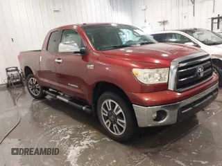 2010 Toyota Tundra z VIN 5TFUW5F16AX113067, wystawiony jako IAAI lot #41826361 z przebiegiem 128 279 mil mil oraz . Historia ofert i sprzedaży dostępna na DreamBid. Obrazek 1.