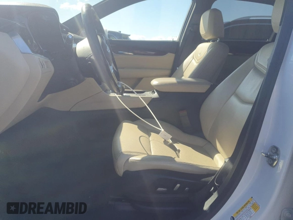 2019 Cadillac XT5 Premium Luxury AWD z VIN 1GYKNFRS5KZ252885, wystawiony jako Copart lot #49729865 z przebiegiem 54 593 mil mil oraz Szkoda całkowita • Salvage title. Historia ofert i sprzedaży dostępna na DreamBid. Obrazek 7.