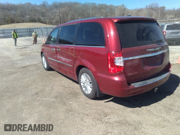 2014 Chrysler Town & Country Limited with VIN 2C4RC1GG5ER463952, listed as a IAAI auction lot 41825303 with 150,131 mi miles and . Bid and sale history available at DreamBid. Image 3.