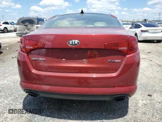2013 Kia Optima EX z VIN 5XXGN4A75DG183192, wystawiony jako Copart lot #57114525 z przebiegiem 201 167 mil mil oraz Czysty tytuł • Clean title. Historia ofert i sprzedaży dostępna na DreamBid. Obrazek 6.