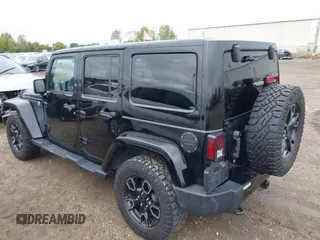 2018 Jeep Wrangler JK Unlimited Altitude with VIN 1C4BJWEG7JL881133, listed as a IAAI auction lot 40404302 with 95,726 mi miles. Bid and sale history available at carsss.com. Image 3.