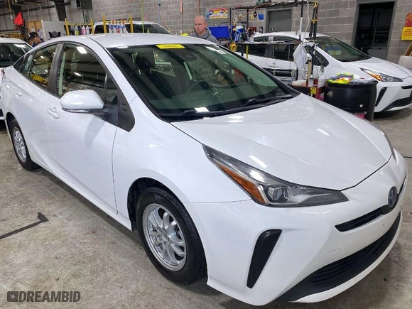 2019 Toyota Prius L Eco with VIN JTDKARFU6K3089689, listed as a IAAI auction lot 41982369 with 133,027 mi miles. Bid and sale history available at carsss.com. Image 1.