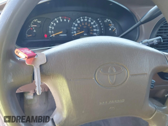 2000 Toyota Tundra SR5 with VIN 5TBRT3413YS019873, listed as a IAAI auction lot 41412497 with 305,472 mi miles and . Bid and sale history available at DreamBid. Image 11.