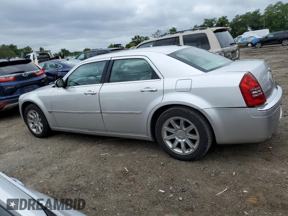 2006 Chrysler 300 C with VIN 2C3LA63H06H527558, listed as a Copart auction lot 64665314 with 74,237 mi miles and Salvage Title. Bid and sale history available at carsss.com. Image 2.