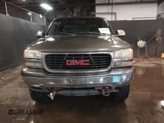 2000 GMC Sierra 1500 SLE with VIN 1GTEK19T0YZ211077, listed as a IAAI auction lot 41626980 with 224,823 mi miles and . Bid and sale history available at DreamBid. Image 12.