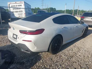 2022 BMW 8 Series 840i with VIN WBAGV2C01NCJ90613, listed as a IAAI auction lot 41997214 with 28,014 mi miles. Bid and sale history available at carsss.com. Image 4.