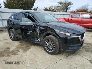 2017 Mazda CX-5 Touring with VIN JM3KFACLXH0195725, listed as a Copart auction lot 47464365 with 65,457 mi miles and Salvage Title. Bid and sale history available at carsss.com. Image 4.
