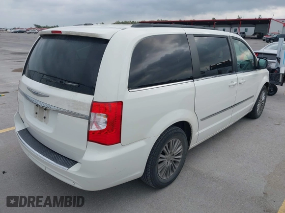 2013 Chrysler Town & Country Touring-L with VIN 2C4RC1CG2DR508799, listed as a IAAI auction lot 42092504 with 140,775 mi miles. Bid and sale history available at carsss.com. Image 4.