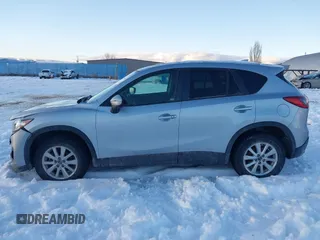 2016 Mazda CX-5 Touring with VIN JM3KE4CY9G0904000, listed as a IAAI auction lot 41186630 with 73,900 mi miles. Bid and sale history available at carsss.com. Image 14.