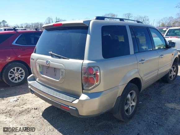 2006 Honda Pilot EX-L with RES with VIN 5FNYF28626B016118, listed as a IAAI auction lot 41819365 with 314,954 mi miles. Bid and sale history available at carsss.com. Image 4.