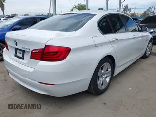 2013 BMW 5 Series 528i with VIN WBAXG5C50DDY34618, listed as a IAAI auction lot 42018050 with 85,272 mi miles and . Bid and sale history available at carsss.com. Image 4.