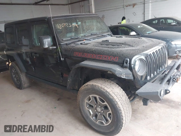 2021 Jeep Wrangler Unlimited Rubicon with VIN 1C4HJXFN2MW587168, listed as a IAAI auction lot 42472309 with 66,272 mi miles and . Bid and sale history available at DreamBid. Image 1.