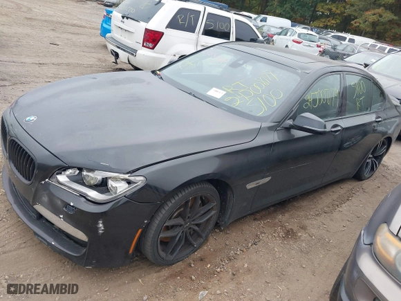 2015 BMW 7 Series 750i xDrive with VIN WBAYB6C57FD965802, listed as a IAAI auction lot 40588698 with 999,999 mi miles. Bid and sale history available at carsss.com. Image 16.