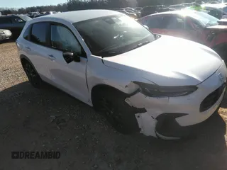 2024 Honda HR-V Sport z VIN 3CZRZ1H50RM740994, wystawiony jako IAAI lot #41492191 z przebiegiem 14 049 mil mil oraz . Historia ofert i sprzedaży dostępna na DreamBid. Obrazek 1.