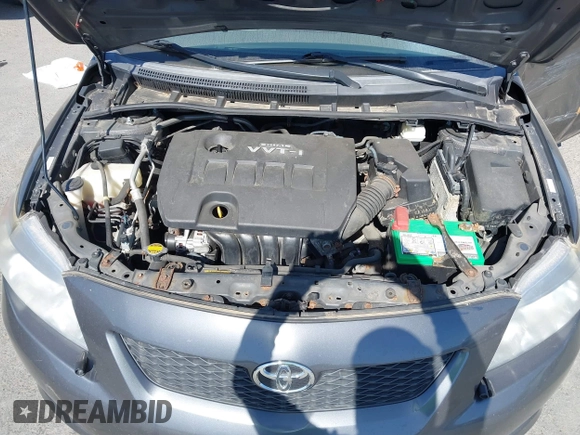 2009 Toyota Corolla with VIN 1NXBU40E99Z108425, listed as a IAAI auction lot 39553892 with 208,165 mi miles and . Bid and sale history available at DreamBid. Image 10.