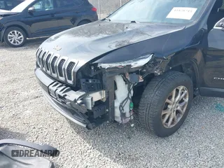 2015 Jeep Cherokee Latitude with VIN 1C4PJLCB3FW517843, listed as a IAAI auction lot 41828715 with 146,862 mi miles and . Bid and sale history available at DreamBid. Image 6.