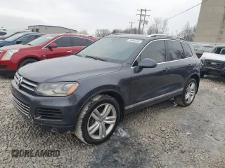 2012 Volkswagen Touareg Sport z VIN WVGFK9BP6CD005005, wystawiony jako Copart lot #46802355 z przebiegiem 141 430 mil mil oraz Czysty tytuł • Clean title. Historia ofert i sprzedaży dostępna na DreamBid. Obrazek 1.