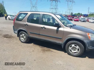 2004 Honda CR-V LX with VIN JHLRD68444C015503, listed as a IAAI auction lot 42145422 with 189,975 mi miles and . Bid and sale history available at carsss.com. Image 1.