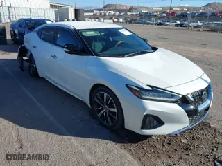 2021 Nissan Maxima SV with VIN 1N4AA6CV0MC515568, listed as a IAAI auction lot 41265961 with 1,094 mi miles. Bid and sale history available at carsss.com. Image 1.