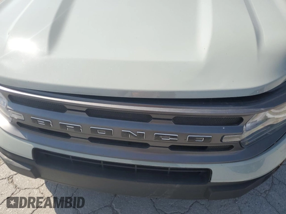 2022 Ford Bronco Sport Big Bend z VIN 3FMCR9B64NRE04995, wystawiony jako Copart lot #53064825 z przebiegiem 32 739 mil mil oraz Czysty tytuł • Clean title. Historia ofert i sprzedaży dostępna na DreamBid. Obrazek 13.