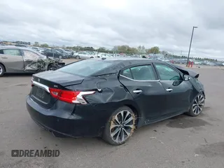2016 Nissan Maxima SR z VIN 1N4AA6AP9GC386237, wystawiony jako IAAI lot #42166280 z przebiegiem 130 091 mil mil oraz . Historia ofert i sprzedaży dostępna na DreamBid. Obrazek 4.