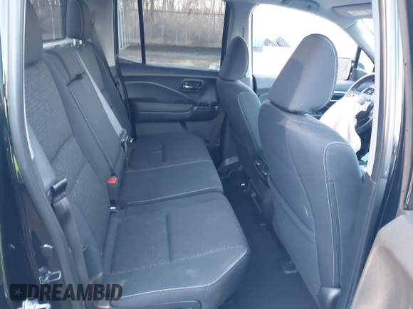 2024 Honda Ridgeline Sport with VIN 5FPYK3F14RB012334, listed as a IAAI auction lot 41542412 with 1,817 mi miles and . Bid and sale history available at DreamBid. Image 8.