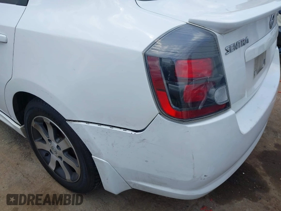 2012 Nissan Sentra 2.0 z VIN 3N1AB6AP1CL640743, wystawiony jako IAAI lot #42165025 z przebiegiem 156 311 mil mil oraz . Historia ofert i sprzedaży dostępna na DreamBid. Obrazek 6.
