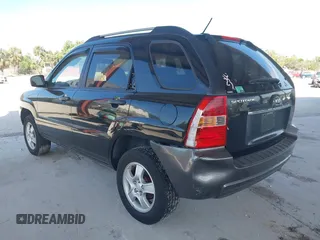 2007 Kia Sportage LX with VIN KNDJF724877450962, listed as a IAAI auction lot 41918290 with 216,476 mi miles and . Bid and sale history available at carsss.com. Image 3.