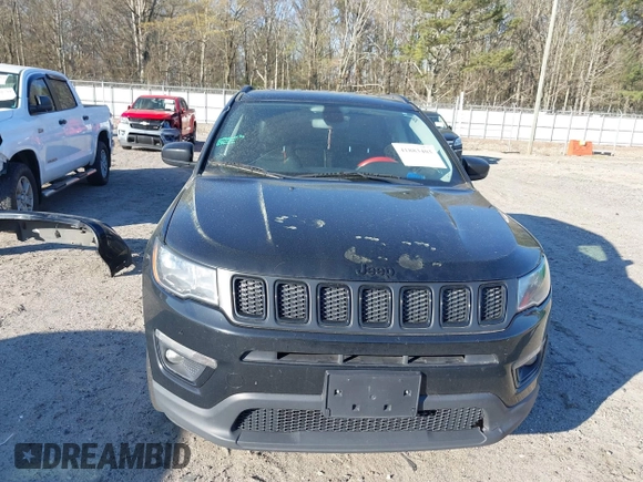 2019 Jeep Compass Latitude with VIN 3C4NJDBB1KT661261, listed as a IAAI auction lot 41883403 with 207,304 mi miles and . Bid and sale history available at DreamBid. Image 13.