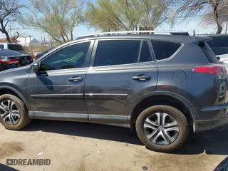 2018 Toyota RAV4 LE with VIN JTMZFREV2JJ190085, listed as a IAAI auction lot 41895635 with 54,577 mi miles. Bid and sale history available at carsss.com. Image 14.