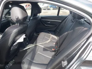 2018 BMW 3 Series 330i xDrive with VIN WBA8D9G59JNU72227, listed as a IAAI auction lot 41463619 with 79,987 mi miles and . Bid and sale history available at DreamBid. Image 8.